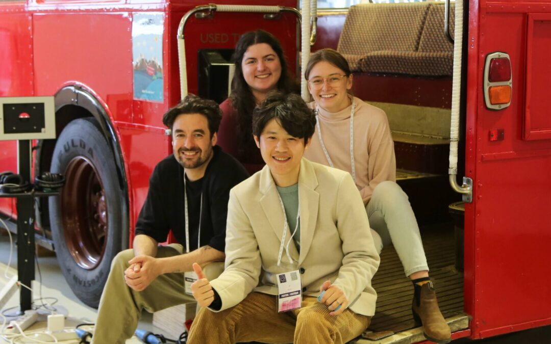 Team Ctrl Z on the edge of a London red bus, from Left to Right: Kieran, Nildene, Howard and Eilish.